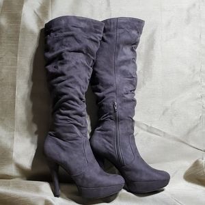Tall gray, faux suede boots.